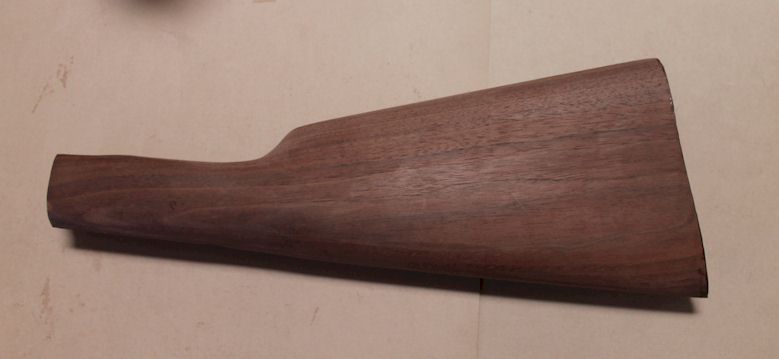Stock Winchester 1895 Black Walnut uses metal buttplate with claw